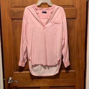 V neck, long sleeve blouse. Roll up cuffed sleeve.